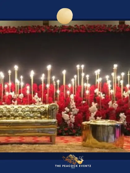 For a glamorous Sangeet or cocktail night, I designed this stunning stage combining a rich red floral base with dozens of glowing candles. The custom gold couch adds a touch of royalty, creating a perfect photo-ready backdrop for an evening of celebration.