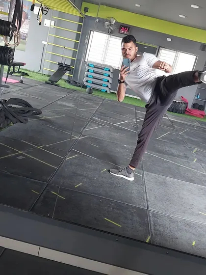 A strong kick starts with a strong core and good flexibility. I practice what I preach, focusing on mastering the fundamentals of martial arts to be a better coach for you.