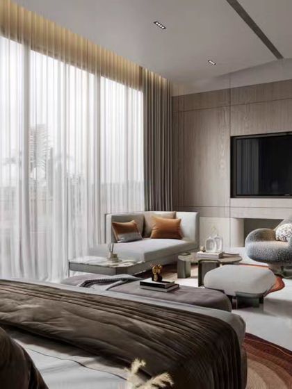 A spacious and bright master bedroom suite with a dedicated seating area by the window. Our renders capture the airy feeling of the room, the elegant furniture, and the seamless integration of a modern fireplace.