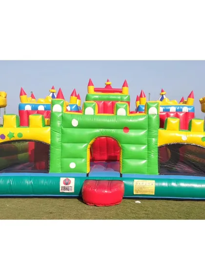 A classic multi-color bouncy castle, perfect for any large outdoor space. This large inflatable provides a huge jumping area for many kids at once.