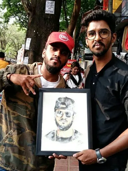 A great moment delivering my portrait to Rahul Dit-O in person. Seeing a client or subject's reaction to my work is the best part of being an artist.