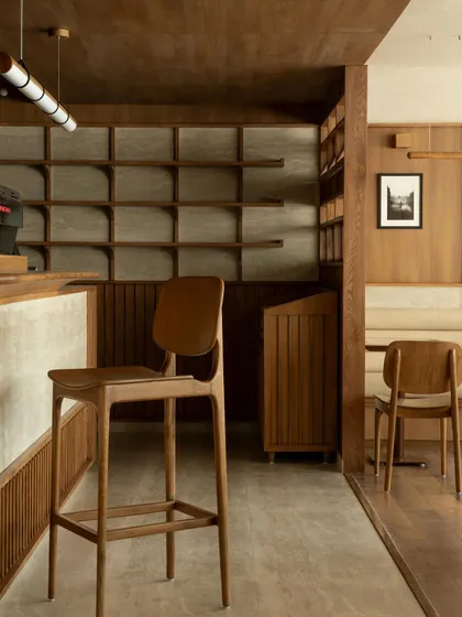 The bar area, with its clean lines and integrated shelving.