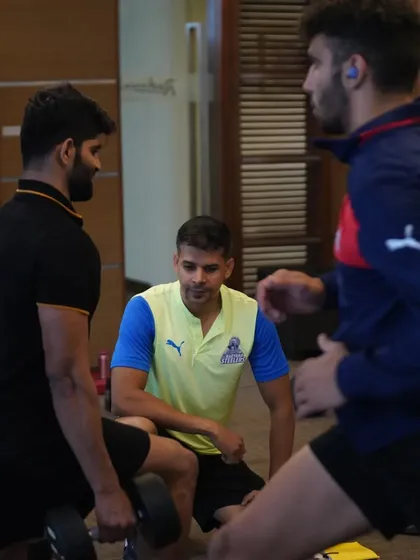 Observing players during a strength session. I'm constantly assessing form and providing feedback.