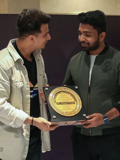 A close-up of the 2022 award plaque, presented by Prince Narula.