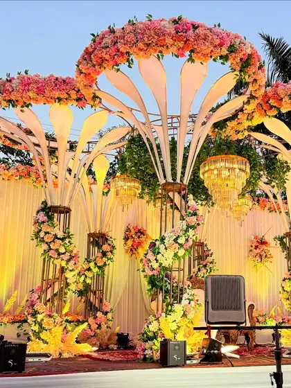 Another view of the modern floral structure stage, showing how it looks from a different angle with the warm lighting.
