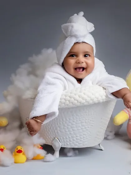 Sunday is a relax day. This little one is enjoying a bubbly bath with her cute ducky friends.