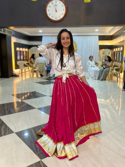 Feeling happy and confident in my Indo-Western Garba outfit. My choreography is just like my style: rooted in tradition but with a modern, fun twist.