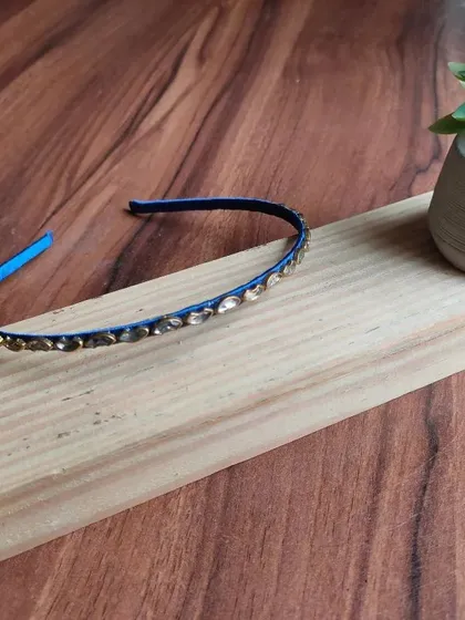 I also create slim, elegant hairbands for a more subtle look. This collection includes a colorful mirror work band and a delicate Kundan work band, perfect for both kids and adults.