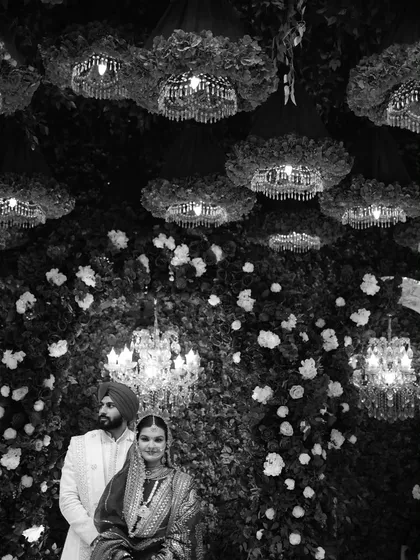 I love playing with different editing styles. This black and white portrait of the Sikh couple creates a dramatic and timeless feel, focusing purely on their presence and the grand decor.