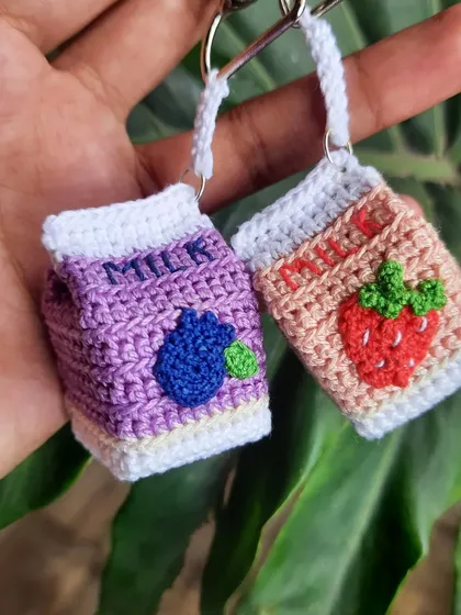 A matching set of blueberry and strawberry milk keychains. These are a super cute idea for a gift for you and a friend.