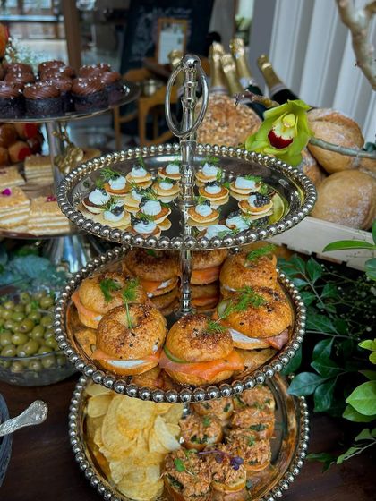 Another view of the tiered stand, a classic and elegant way to present a variety of savory bites.