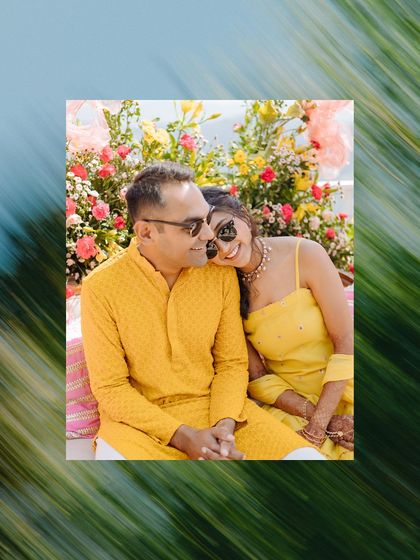 A stylish couple portrait from a Haldi ceremony, with a creative motion blur effect that adds an artistic touch.