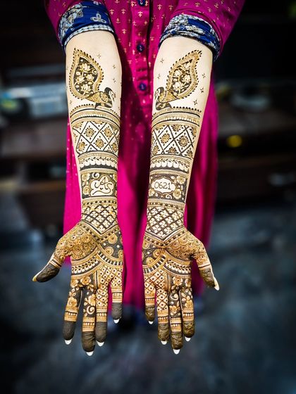 A full view of the symmetrical design on the back of the hands.