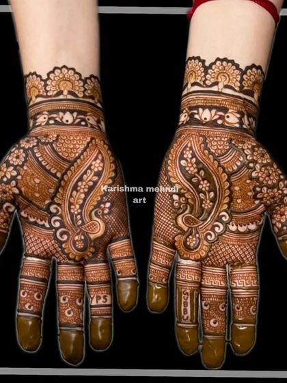 A classic paisley or 'ambi' design for guests. This timeless pattern is filled with intricate details and is a graceful choice for any occasion.