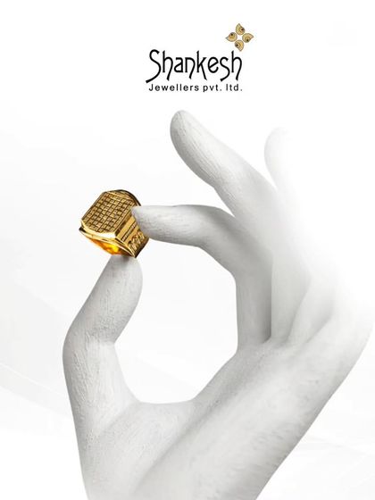 Every ring tells a story. This image of a hand holding one of our men's rings emphasizes the personal connection and style statement that our jewellery represents.