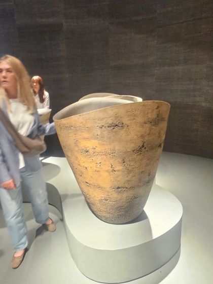 Another view of our large, rustic-finished planters, showcasing their texture and scale.