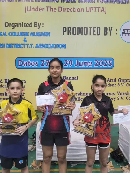 Our young gold medalists Aryaveer, Pehel, and Anokhi with their star-shaped trophies at the 1st UP State Ranking Tournament in Aligarh.