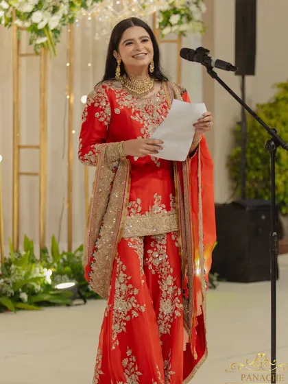 The bride takes the stage to share her own words, a beautiful and personal moment.