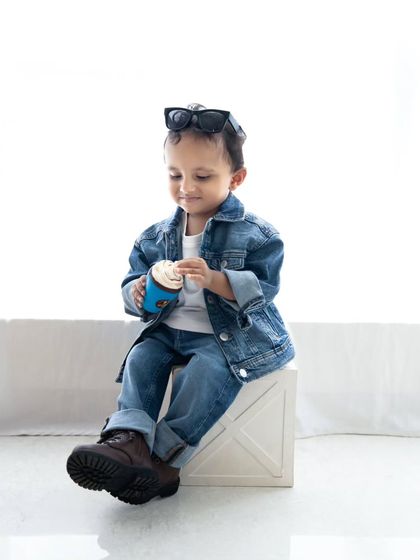 A sweet and gentle moment from the toddler fashion shoot.