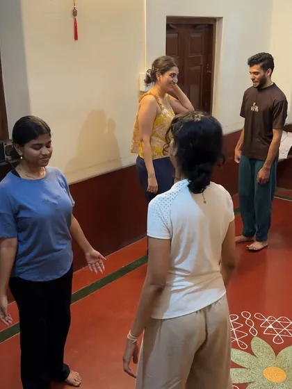 Group interaction during the 'Body Works' movement workshop. These sessions are about building trust and exploring creative expression through physical connection and storytelling.