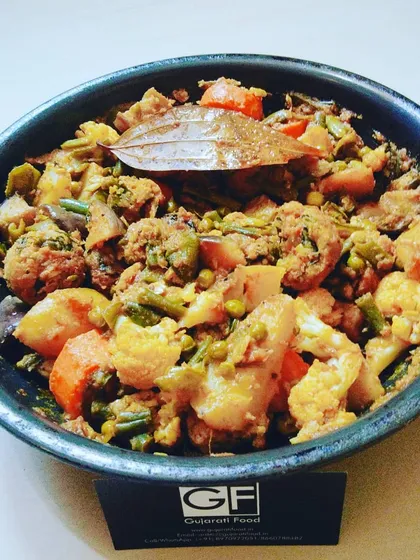 A close-up of my signature winter special, Undhiyu. It's a rich, mixed vegetable dish made with seasonal produce and a blend of aromatic spices, slow-cooked to perfection.