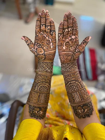 A full bridal mehendi for a happy client. The design features peacock motifs and intricate patterns, creating a stunning look for her special day.