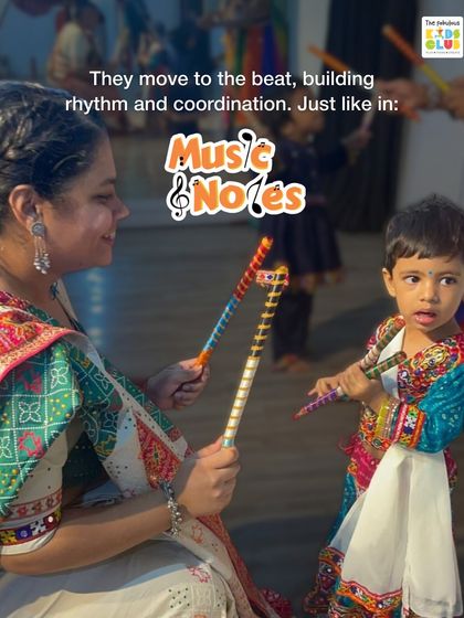 Here, a child learns to play with dandiya sticks during our Navratri celebration, guided by an instructor. This moment shows how we connect our Music & Notes principles of rhythm and coordination with cultural festivities, making learning relevant and fun.