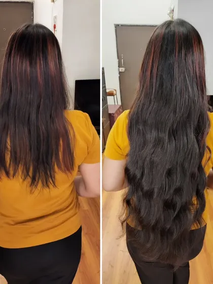 We added dramatic length and texture here. The extensions are styled into deep waves, creating a bold and glamorous look with incredible volume and flow.
