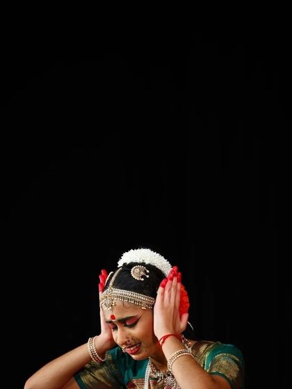 This photograph captures the focus and emotion of my student Sahana during a dramatic sequence in her solo debut performance.
