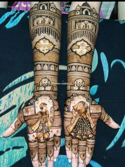 A classic depiction of a bride and groom, with the groom holding a rose for his bride. The design is framed by jharokha-style architecture and lotus symbols on the fingertips.