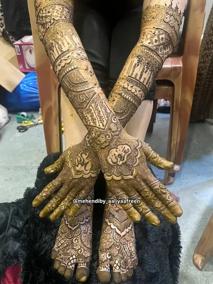 Another angle of the full bridal mehendi, highlighting the consistency and intricacy of the design across hands and feet.