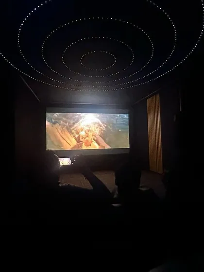 A look at a completed 7.2.4 Dolby Atmos home theater, delivered in just 15 days. The custom fiber optic ceiling creates a magical starlit sky, adding another layer of immersion to your movie-watching experience.