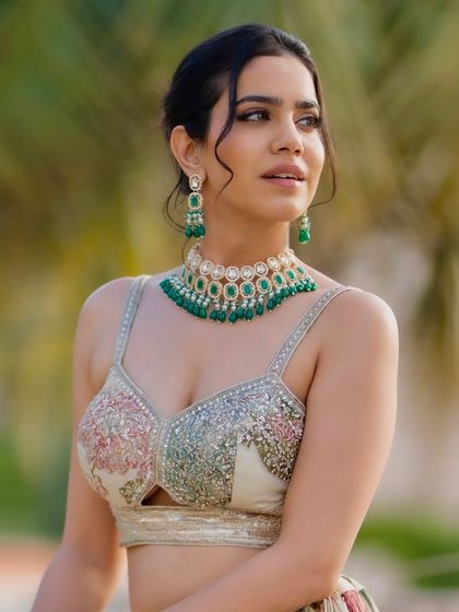 A detailed shot of the embroidered blouse. I love outfits that have intricate work and tell a story.