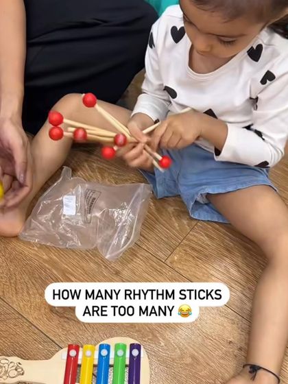 How many rhythm sticks are too many? In our class, the answer is, you can never have too many. It’s all about abundance, exploration, and the simple joy of holding a beat.