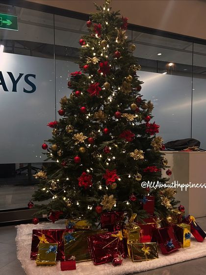 The Christmas tree lighting up the office reception area. It created such a warm and festive welcome.