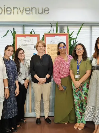 Sénatrice Samantha Cazebonne with our team at the "Bienvenue" desk. She was keen to connect with our students and understand their motivations for learning French.