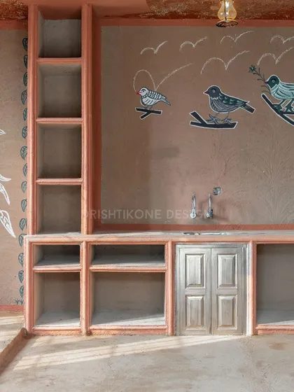 Inspired by tradition, this "Chulha Rasoi" or clay kitchen on a rooftop brings earthy, grounding energy to the home. The use of natural materials and folk art murals is a perfect example of how we integrate Vastu principles with unique, heritage-rich design concepts.