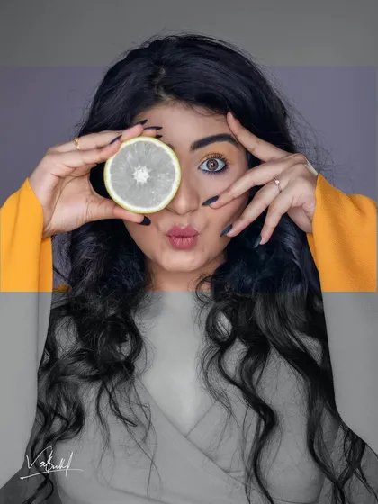 An experimental edit from our creative portrait session. I used a graphic overlay and desaturated tones to give this playful shot a more artistic, magazine-style feel.