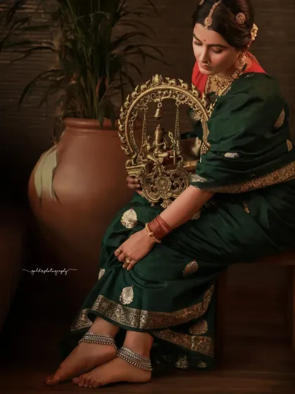 A series of moody and soulful portraits with a vintage feel. The model is styled in a handwoven saree and antique jewelry, with soft, diffused lighting creating a timeless and elegant atmosphere.