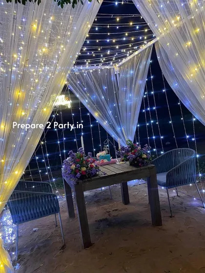 My romantic cabana setups can be customized with different lighting and floral arrangements to create your perfect intimate evening under the stars.