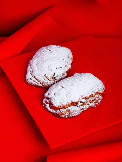Two finished Stollen loaves, ready to be packaged. This is a unique and authentic festive item for your menu.