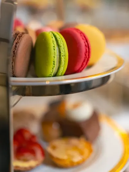 A classic high-tea tower featuring a colourful lineup of our French macarons on the top tier. It’s an elegant presentation that invites guests to indulge.