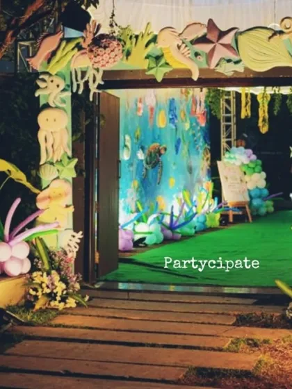 The entrance to this 'Under the Sea' party was framed with custom-made coral and sea creature props, creating a stunning gateway to the main event.