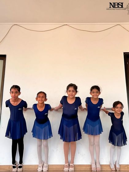 Five of our youngest students at the barre. We teach them proper posture and alignment from their very first class.