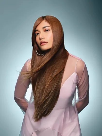 This shot from the Schwarzkopf campaign captures the hair in motion. The makeup is designed to be fresh and radiant, ensuring the model looks flawless from every angle.