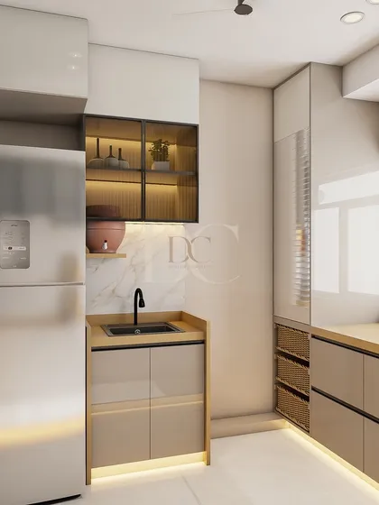 Even smaller kitchens can be highly functional. In this design, we included a dedicated spot for the refrigerator, a small sink area, and a tall pantry unit with wicker baskets for vegetable storage.