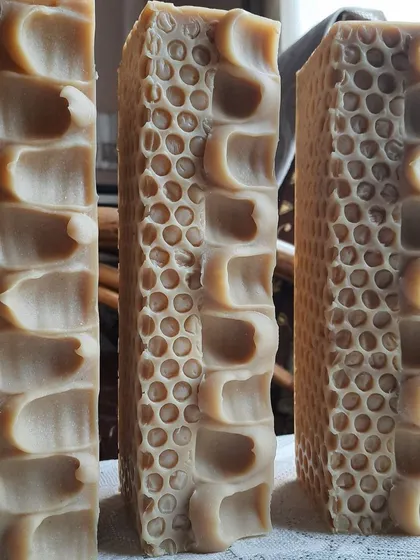 These are my Goatmilk, Oats, and Honey soap towers. The honeycomb texture isn't just beautiful, it also feels wonderful in your hands. This bar is exceptionally gentle and soothing.