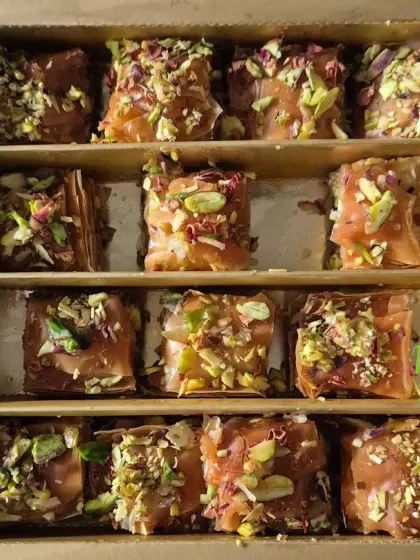 A detailed close-up of the Baklava pieces. You can see the layers of flaky phyllo and the generous filling of chopped nuts.