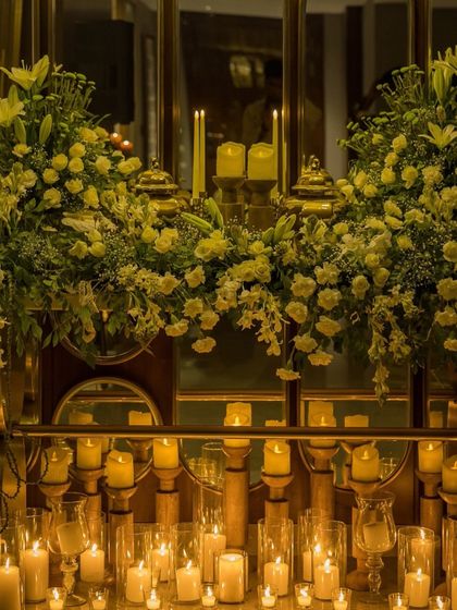 A duplicate of image 128, showing the breathtaking display of candles and flowers for a luxurious Diwali celebration.