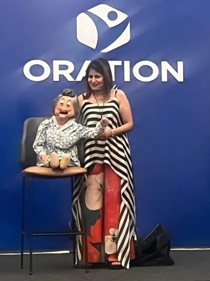 Performing with another one of my puppet friends at the 'Oration 2024' event for Toastmasters. Using different characters with unique voices and personalities keeps the show fresh and engaging for corporate audiences.